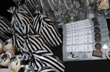 Black and white zebra-striped treat bags with custom Hershey’s bars